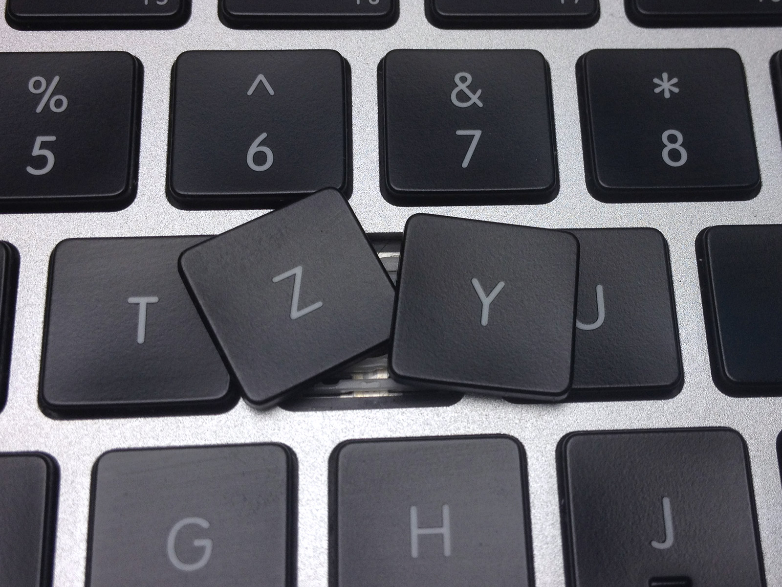 Как снять клавишу с MacBook